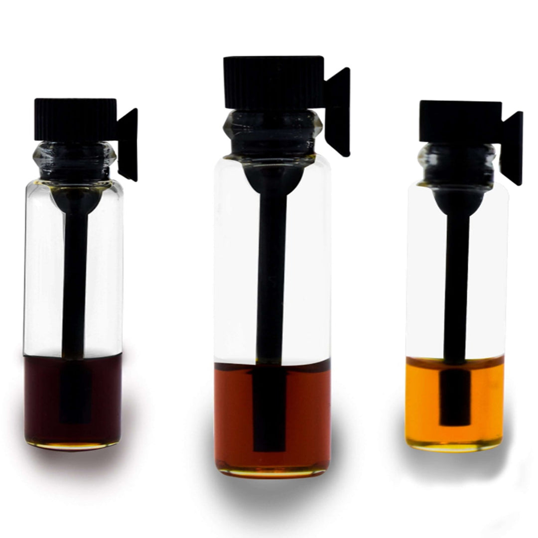 Pure Oud Oil Sample Pack — three 0.3ml vials of Indonesian, Indian and Thai agarwood oil by Pure Oud UK